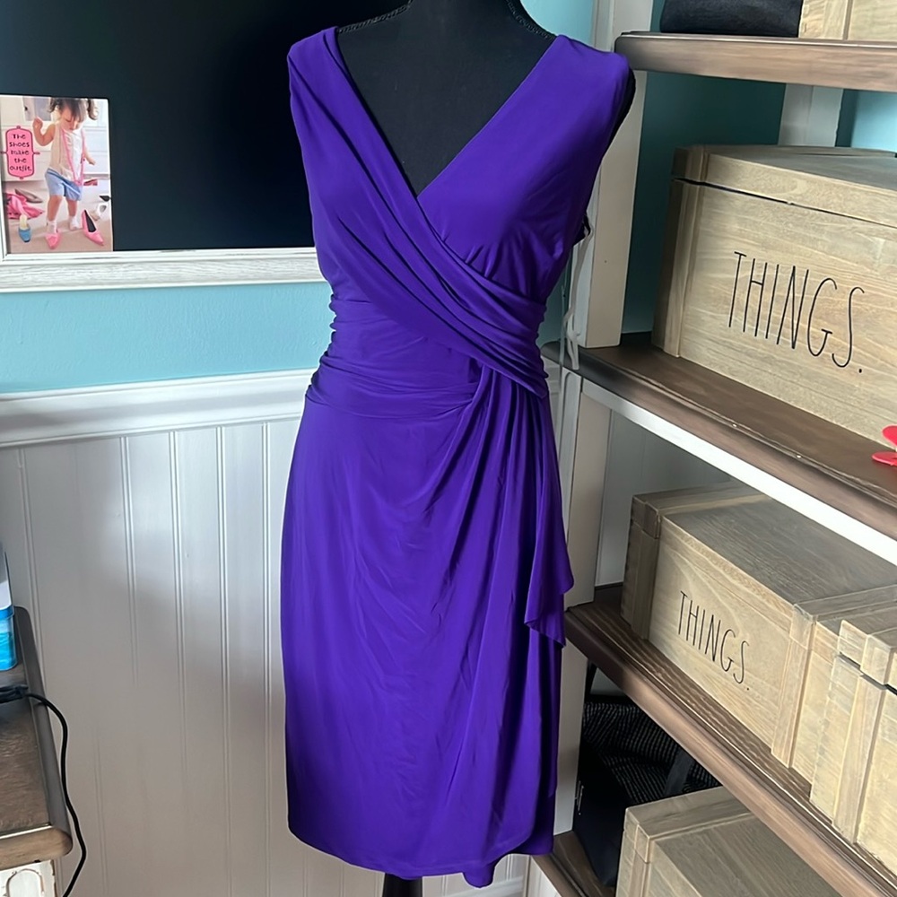 Purple sleeveless faux wrap vneck dress.